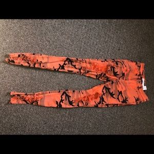 Distressed Orange Skinny Jean
